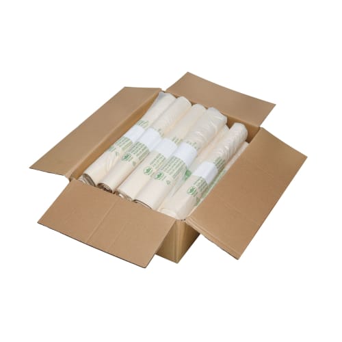 Offene Kartonverpackung mit mehreren Rollen kompostierbarer Müllsäcke in weiß